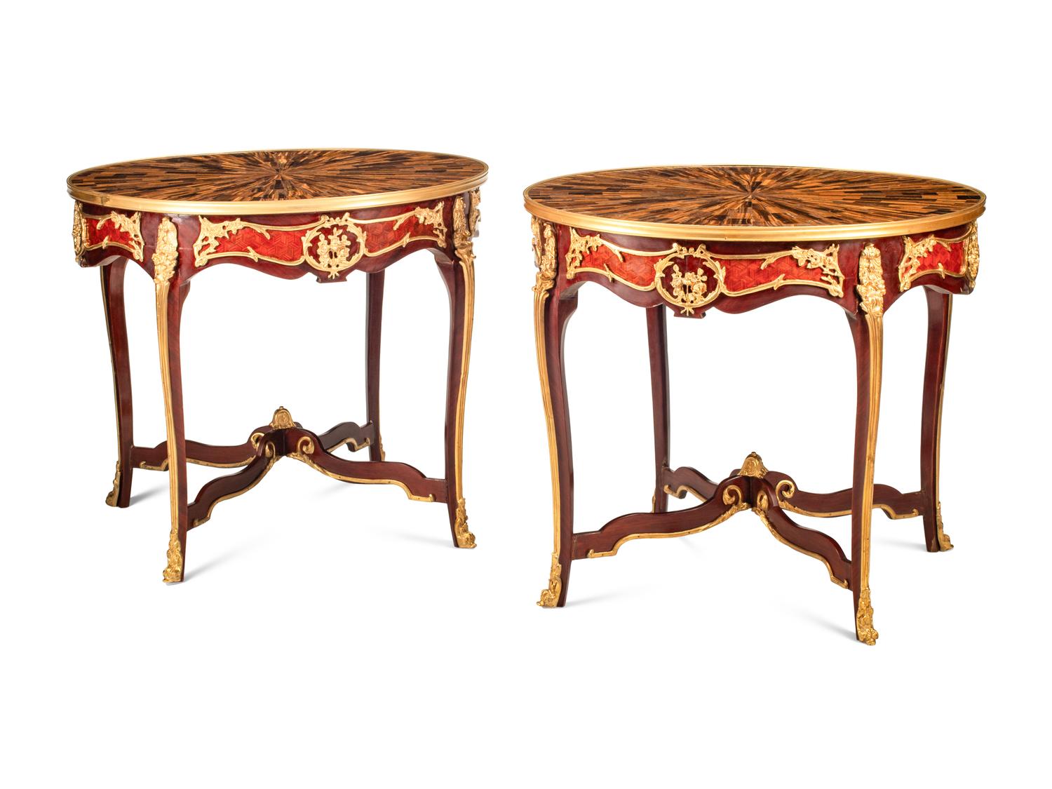 A Pair of Louis XV Style Gilt Bronze Mounted Tables with Tiger's Eye Tops