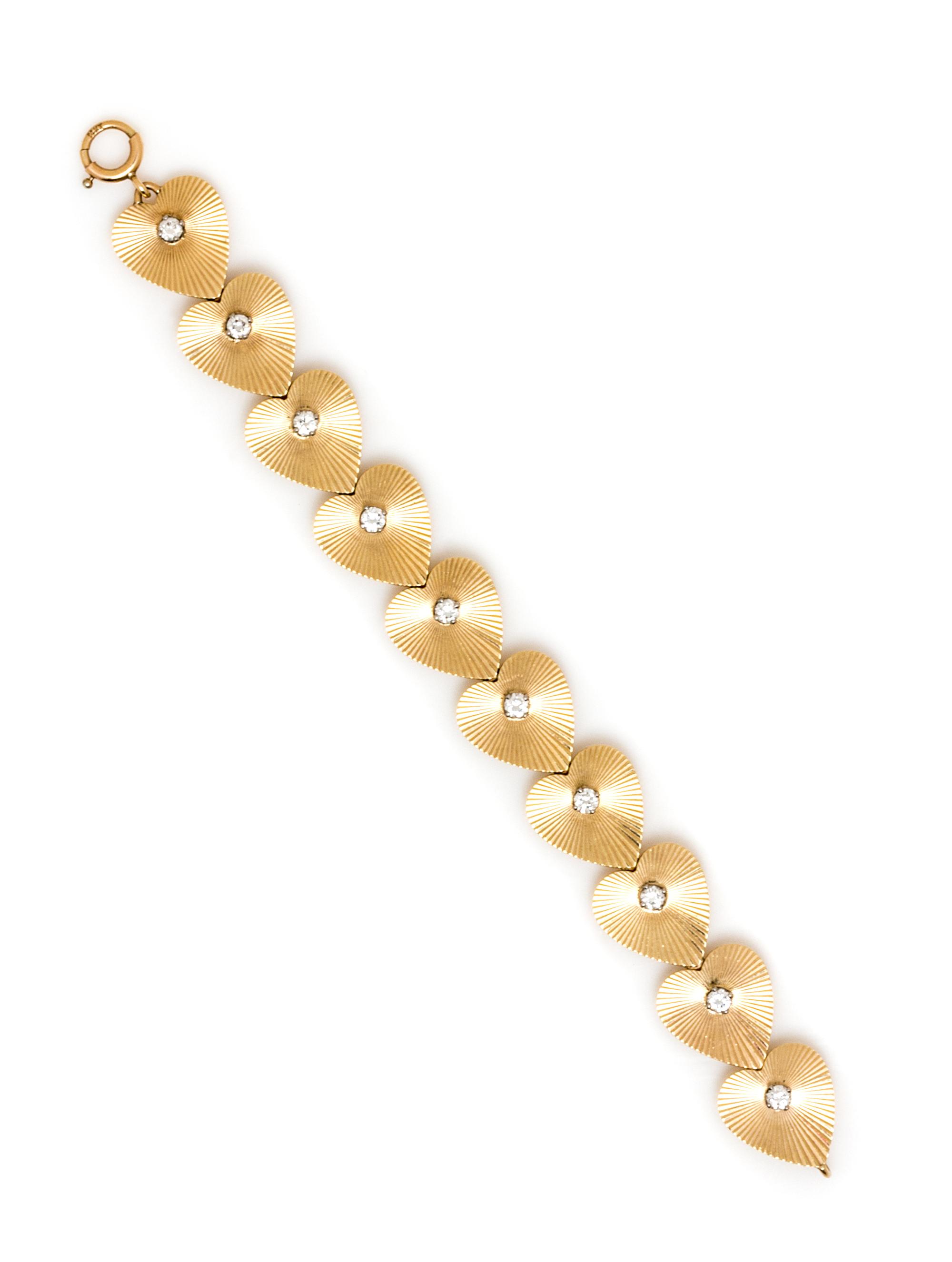 A Retro Yellow Gold and Diamond Heart Motif Bracelet, 14.30 dwts.