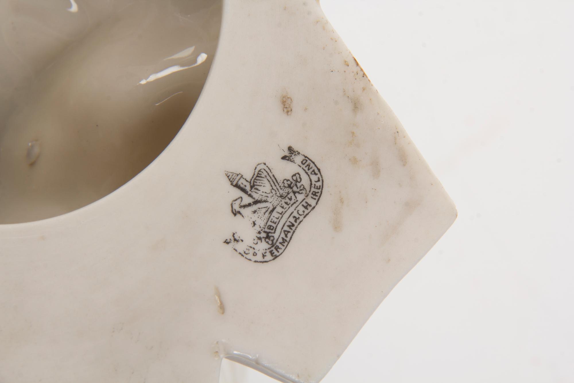 A Belleek Chinese Center Bowl, Height 10 1/4 inches.