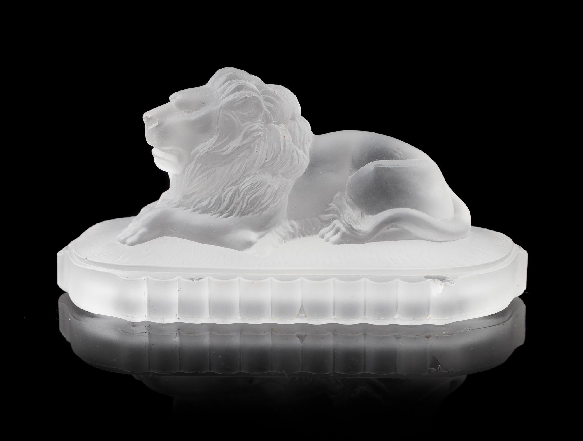 Gillinder Glass, New York, USA, an antique centennial exhibition molded frosted glass lion paperweight