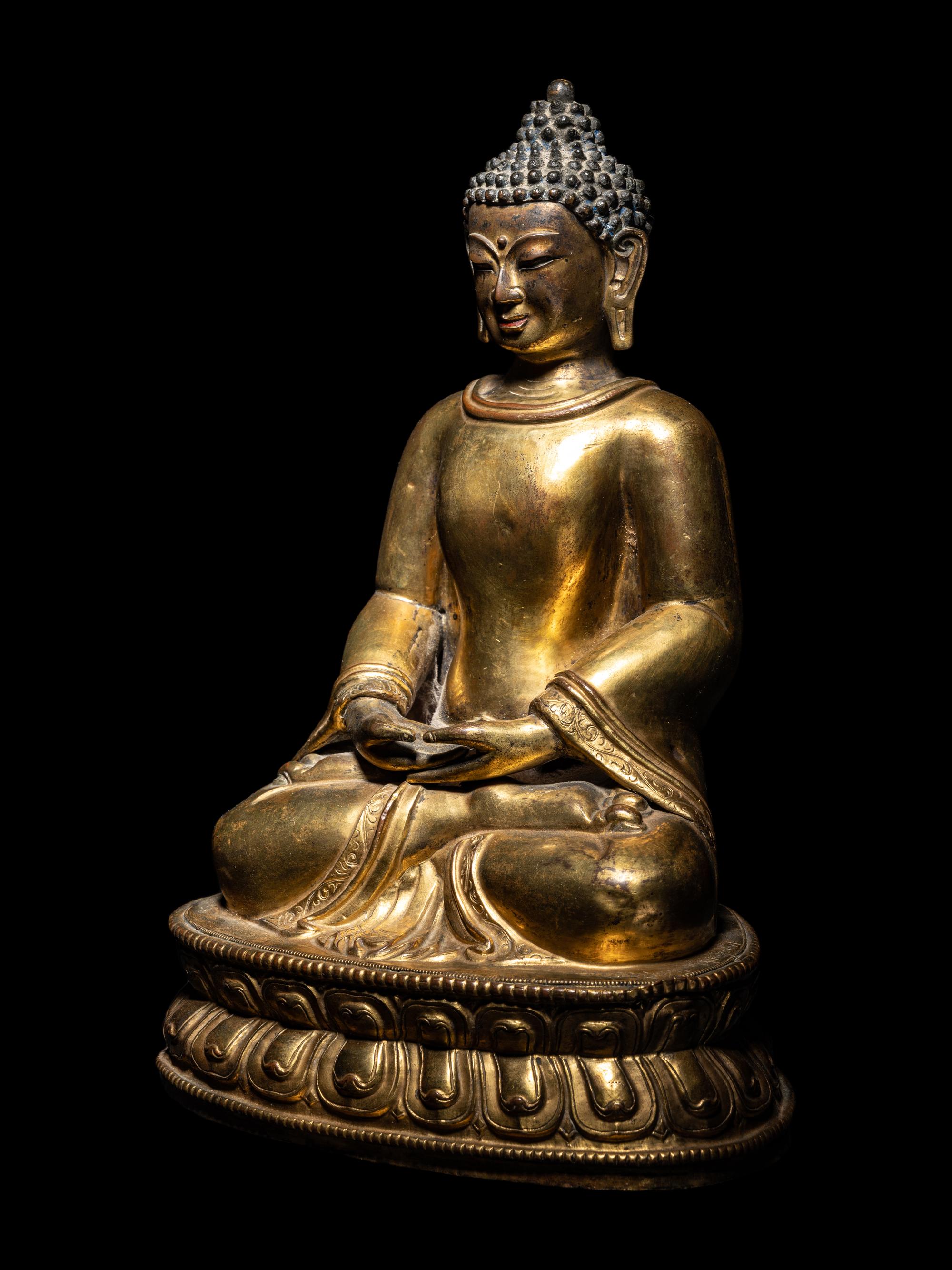 A Large Tibetan Gilt Bronze Figure of Seated Buddha