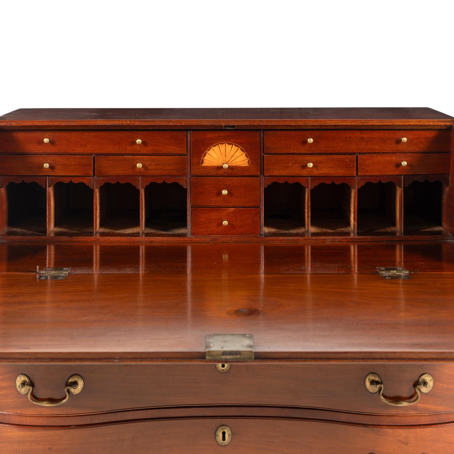 A Chippendale Walnut Serpentine Slant-Front Bureau