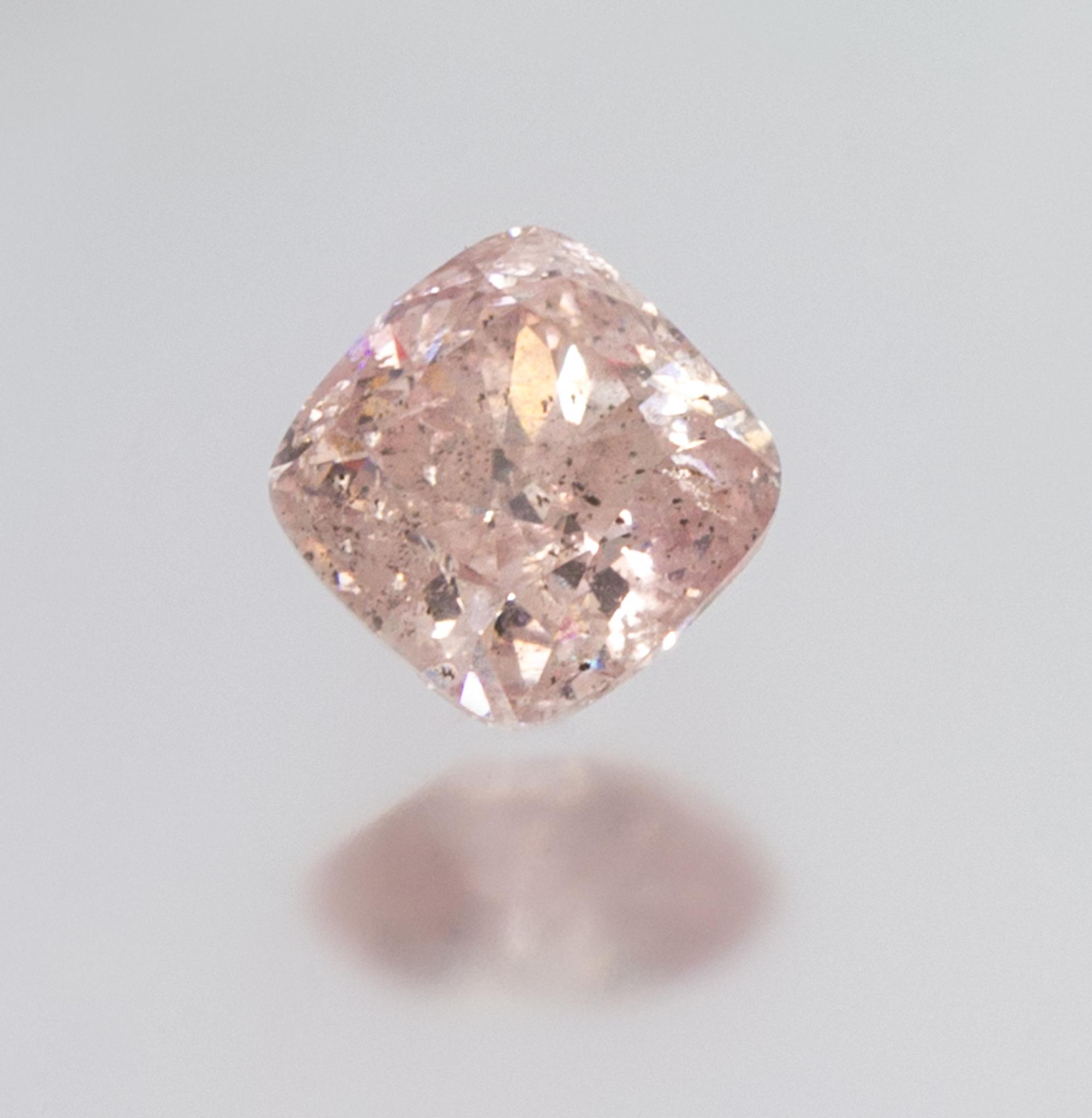 A 1.01 Carat Cushion Cut Fancy Purple Pink Diamond,