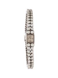 PIAGET, 14K WHITE GOLD AND DIAMOND WATCH