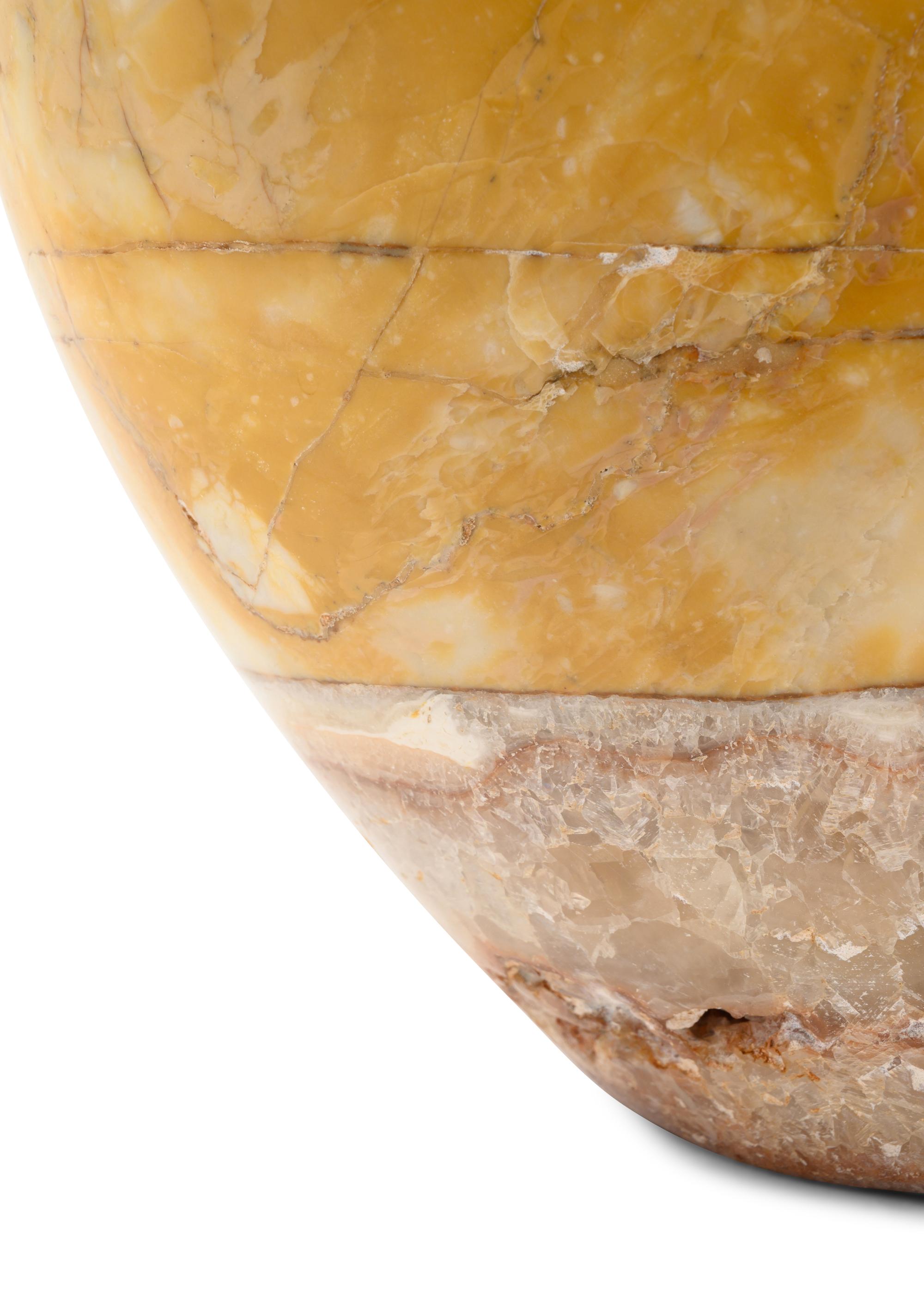 A Carved Marble Bird-Form Ornament