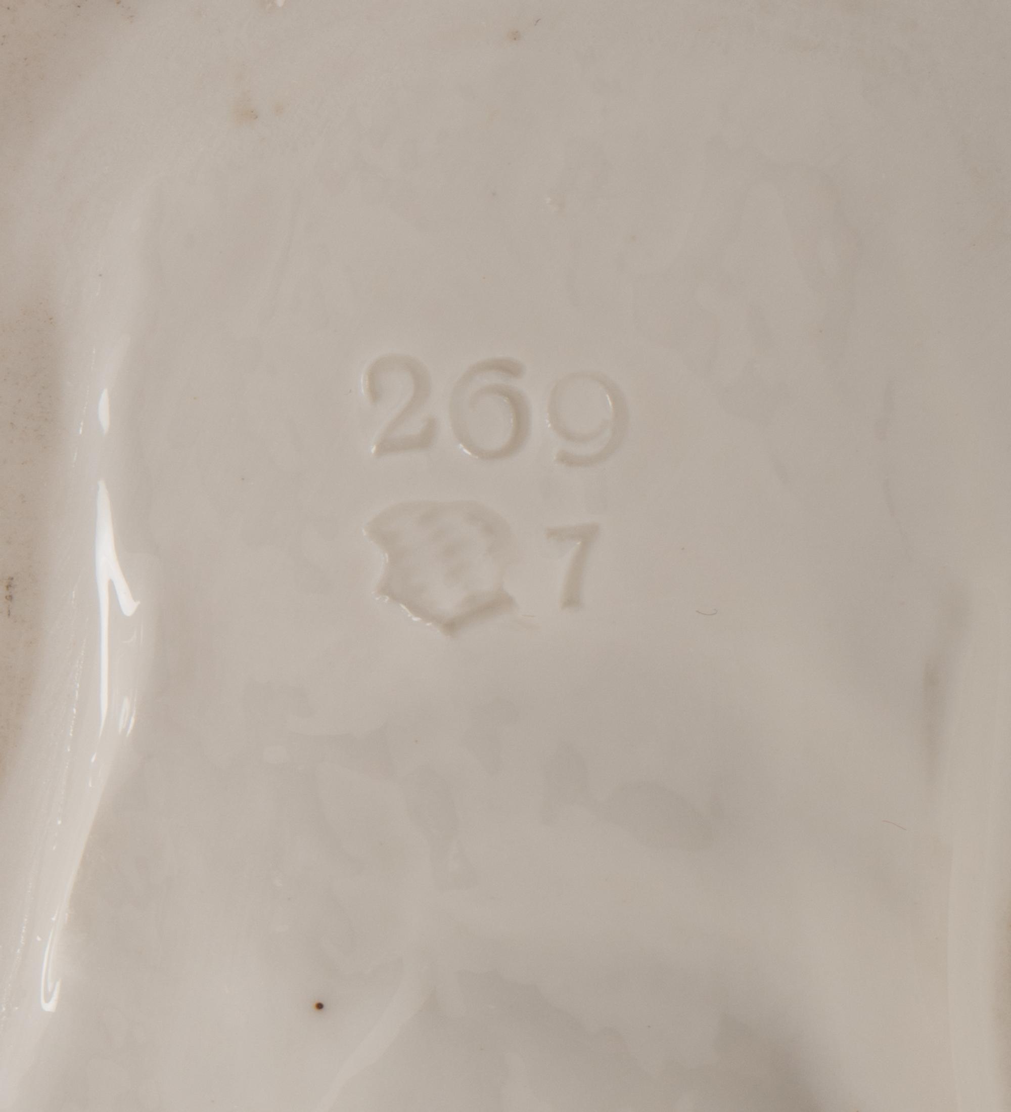 A Group of Twelve Nymphenburg Porcelain Equestrian Groups