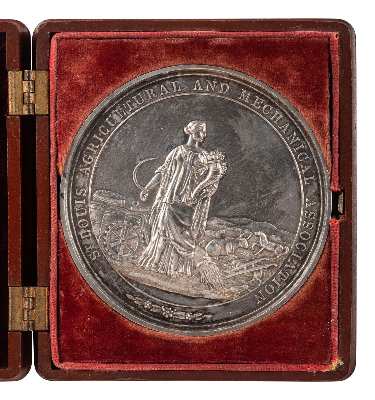 [AGRICULTURE]. St. Louis Agricultural and Mechanical Association silver presentation medal. Ca 1870s.