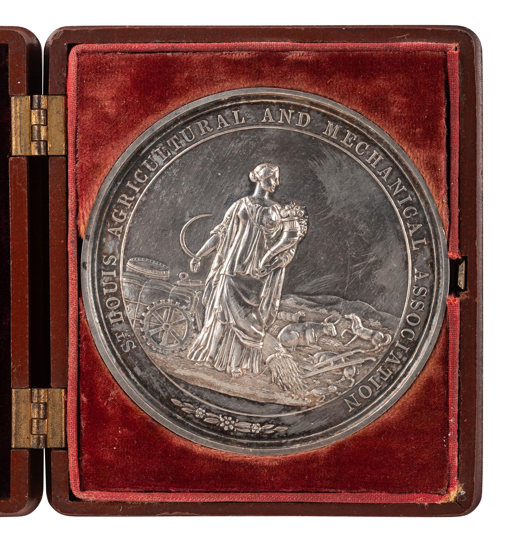 [AGRICULTURE]. St. Louis Agricultural and Mechanical Association silver presentation medal. Ca 1870s.