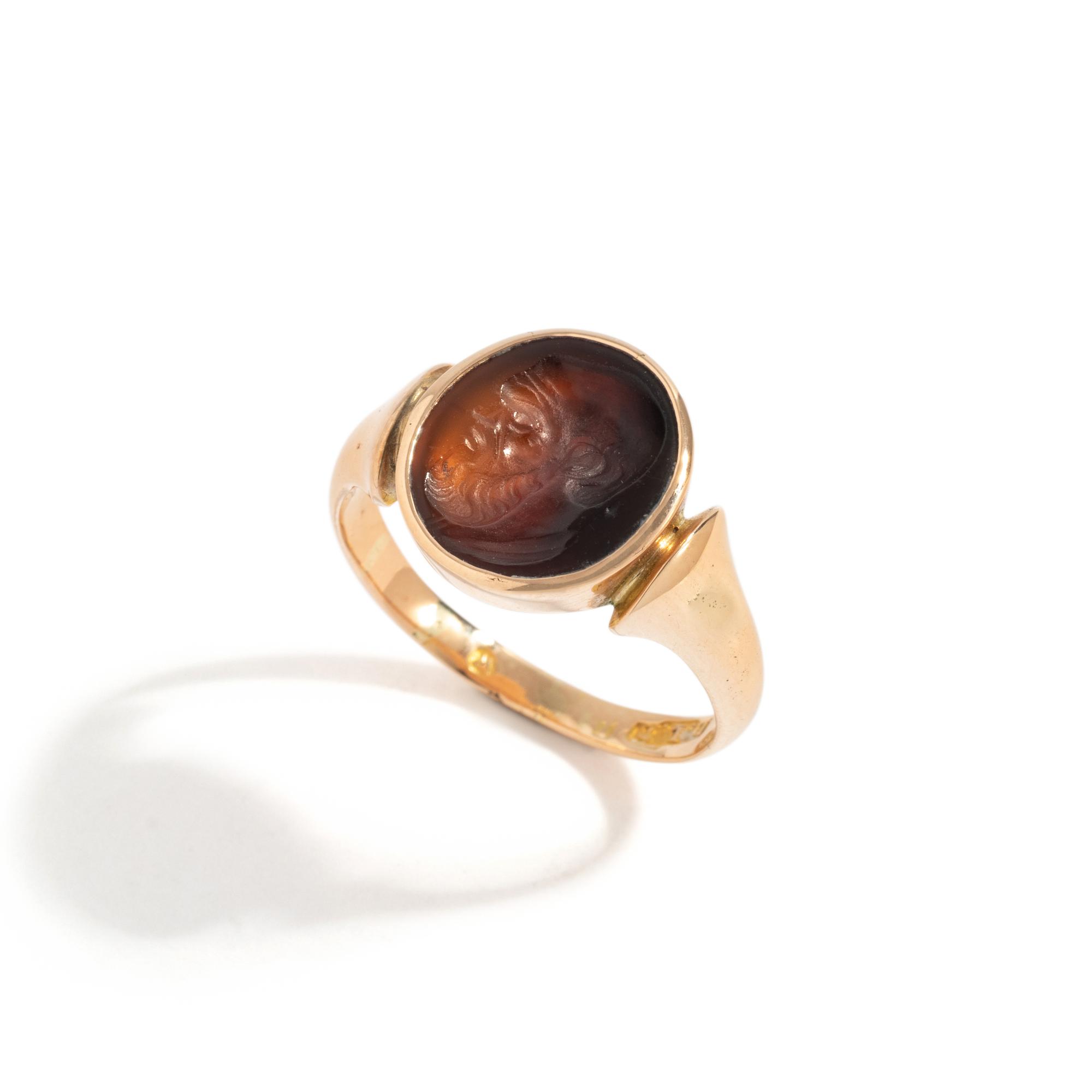 A Neoclassical Gold and Carnelian Finger Ring with a Satyr