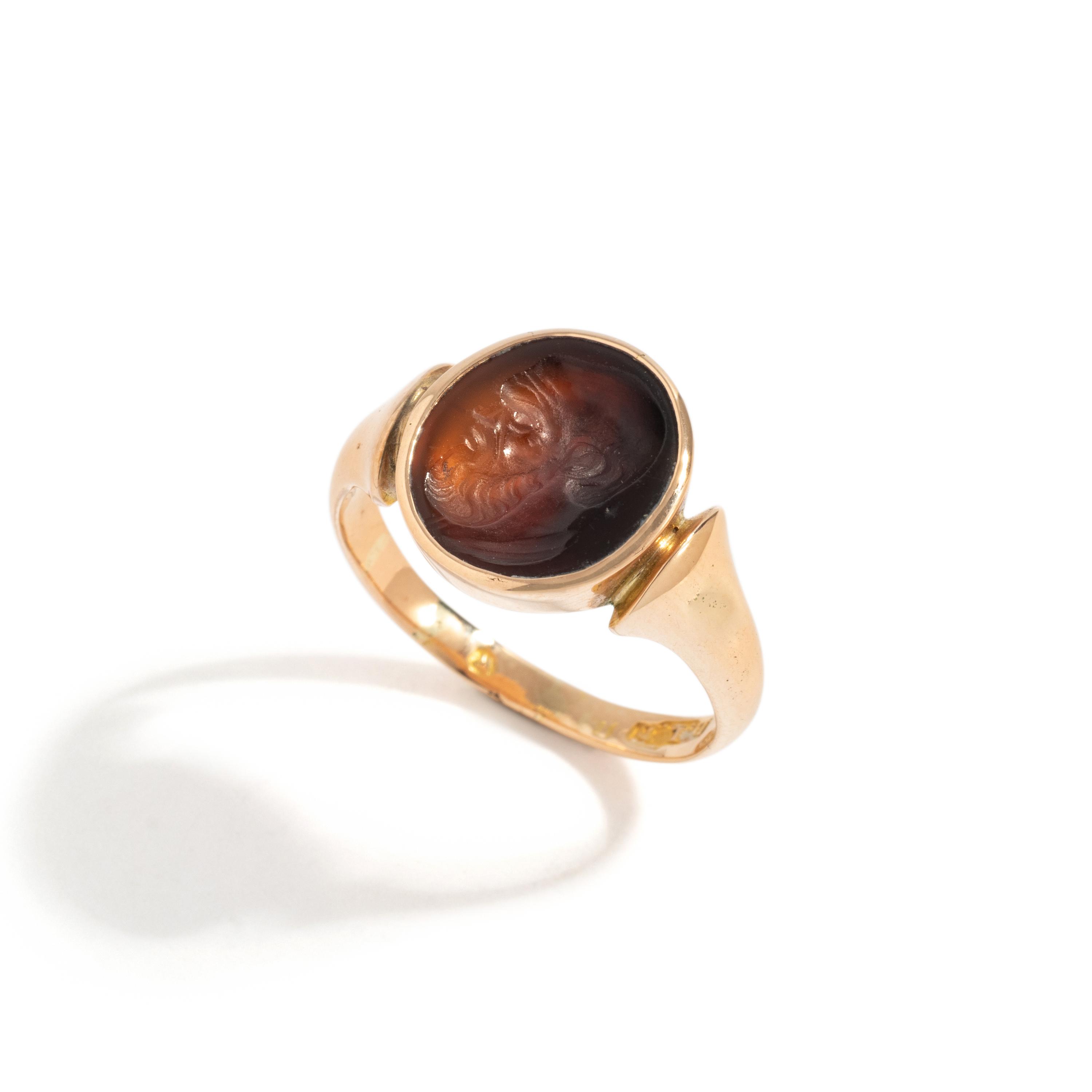 A Neoclassical Gold and Carnelian Finger Ring with a Satyr