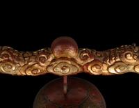 A Set of Gongs with Matching Carved Gilt and Red Lacquered Wood Stand