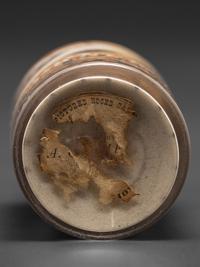 An Early Andrew Clemens (American, 1857-1894) Eagle Sand Bottle