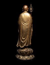 A Chinese Gilt and Lacquered Wood Figure of a Standing Monk
