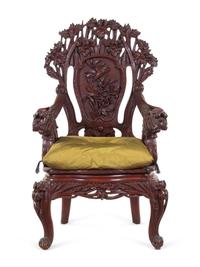 A Chinese Export Carved Hardwood Armchair