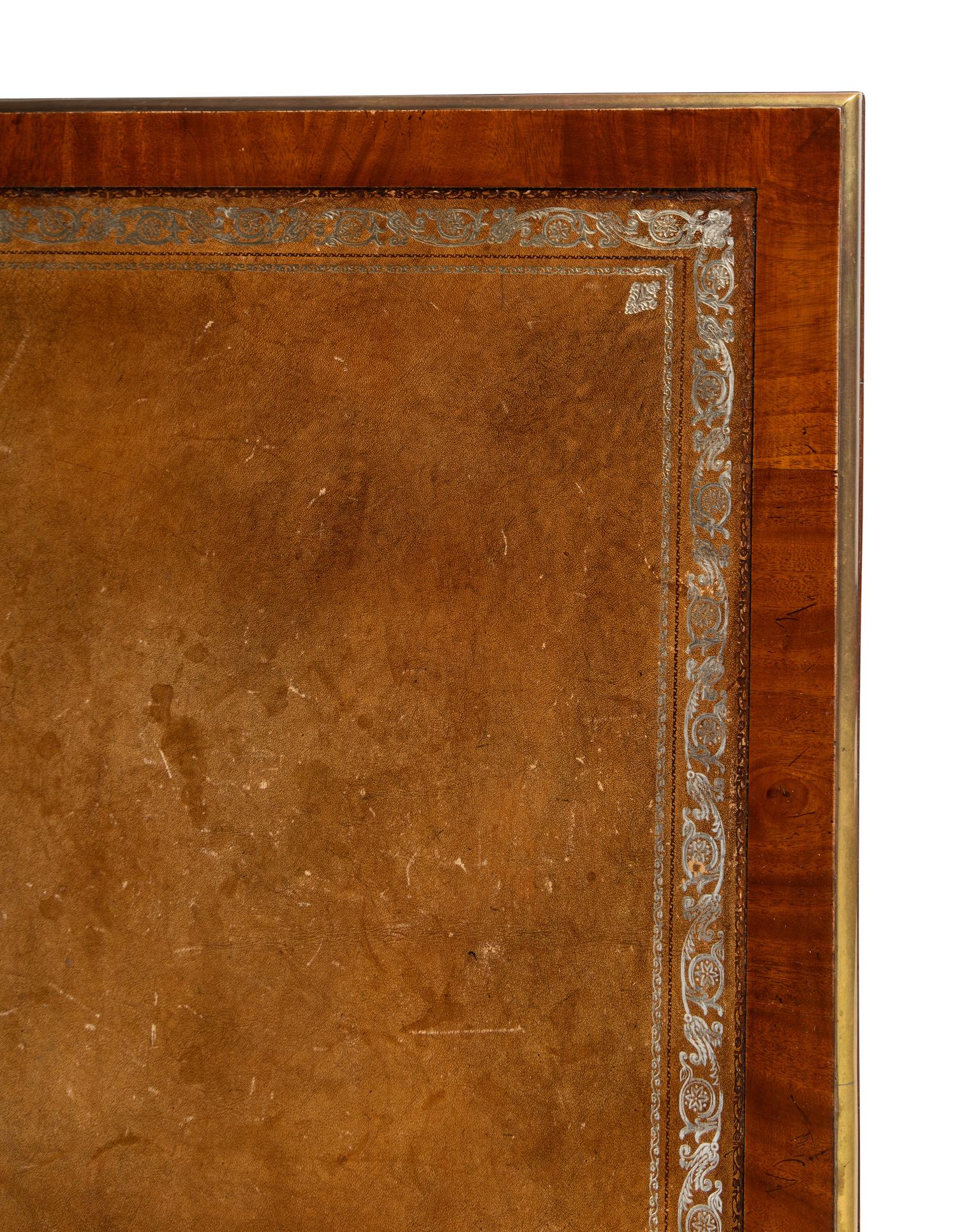 A Directoire Style Brass Mounted Mahogany Bureau Plat