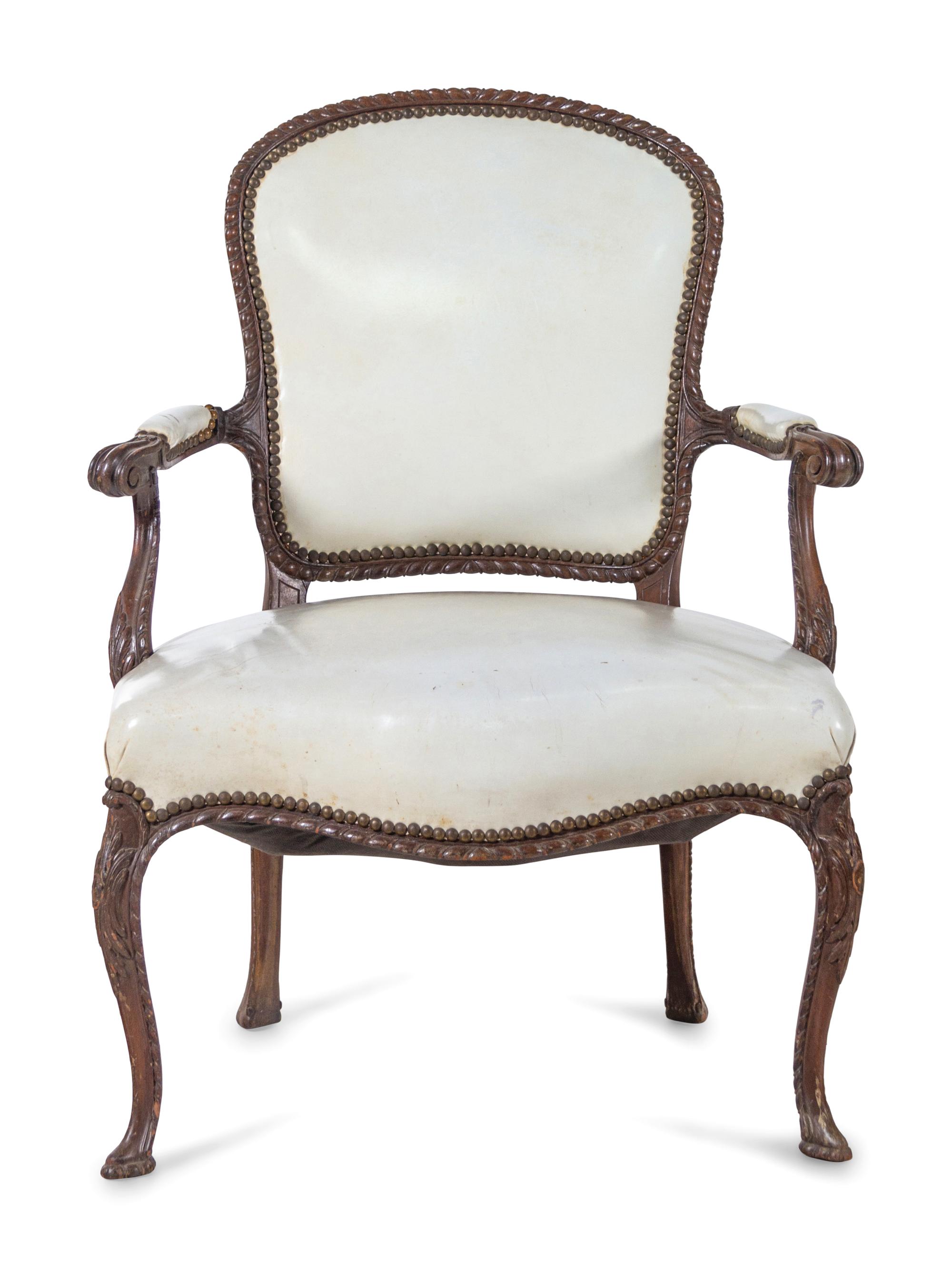 A Pair of George III Carved Mahogany Open Armchairs Attributed to John Cobb (British, c. 1710-1778)