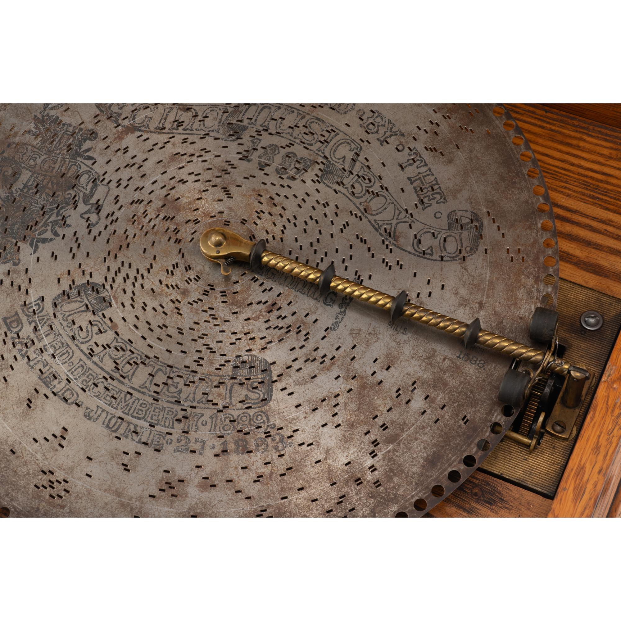 A Regina Oak Tabletop Disc Music Box
