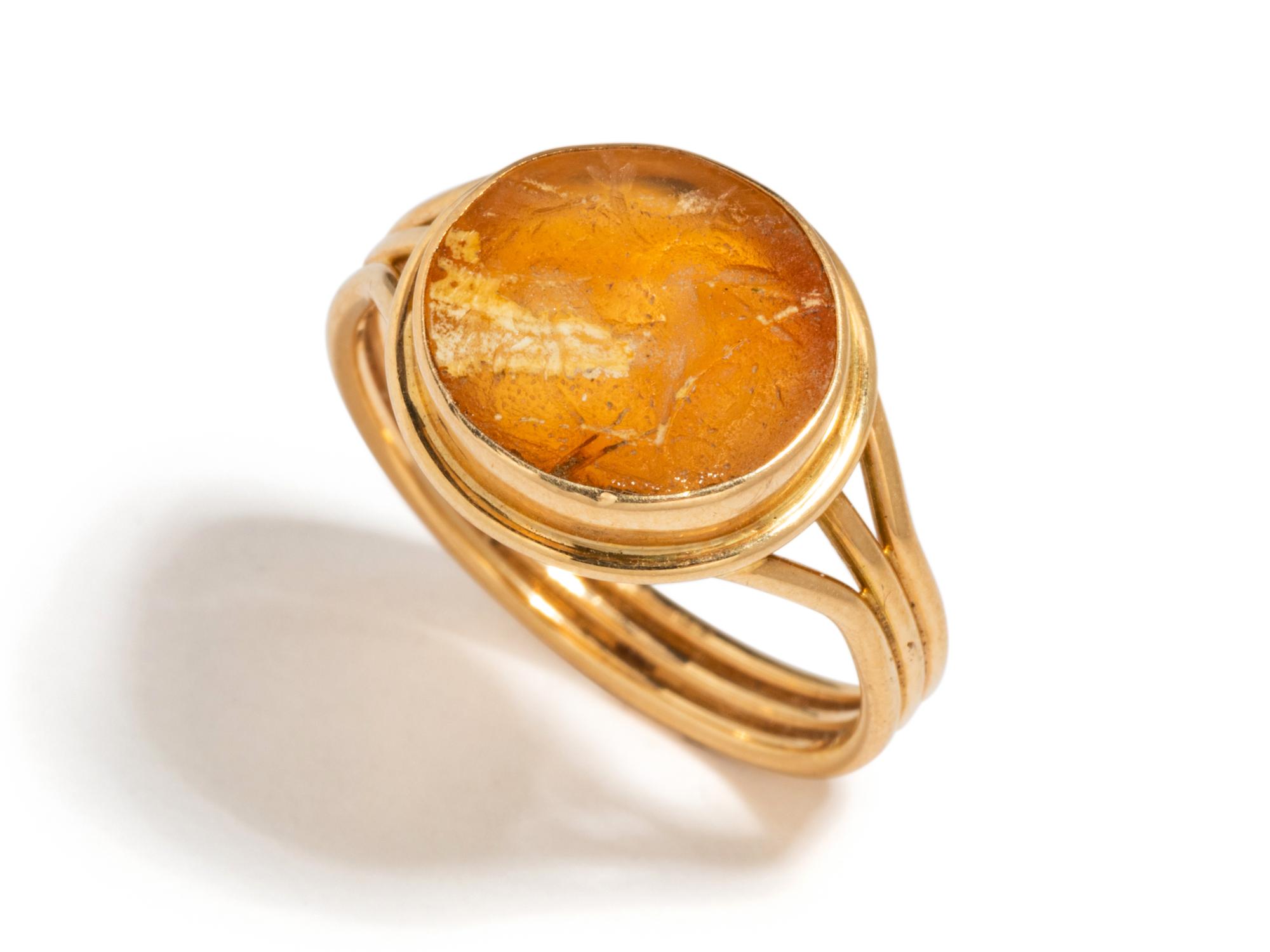 A Roman Agate Ring Stone with a Centaur — Set in a gold ring