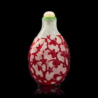 A Chinese Ruby Overlay Glass "Prunus" Snuff Bottle