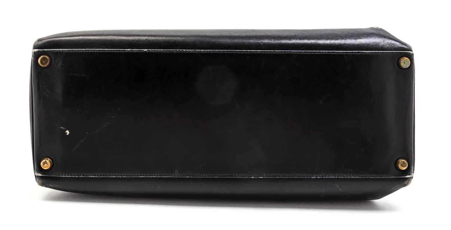 An Hermes 35cm Black Leather Kelly Bag, 14 x 8 x 7 inches.