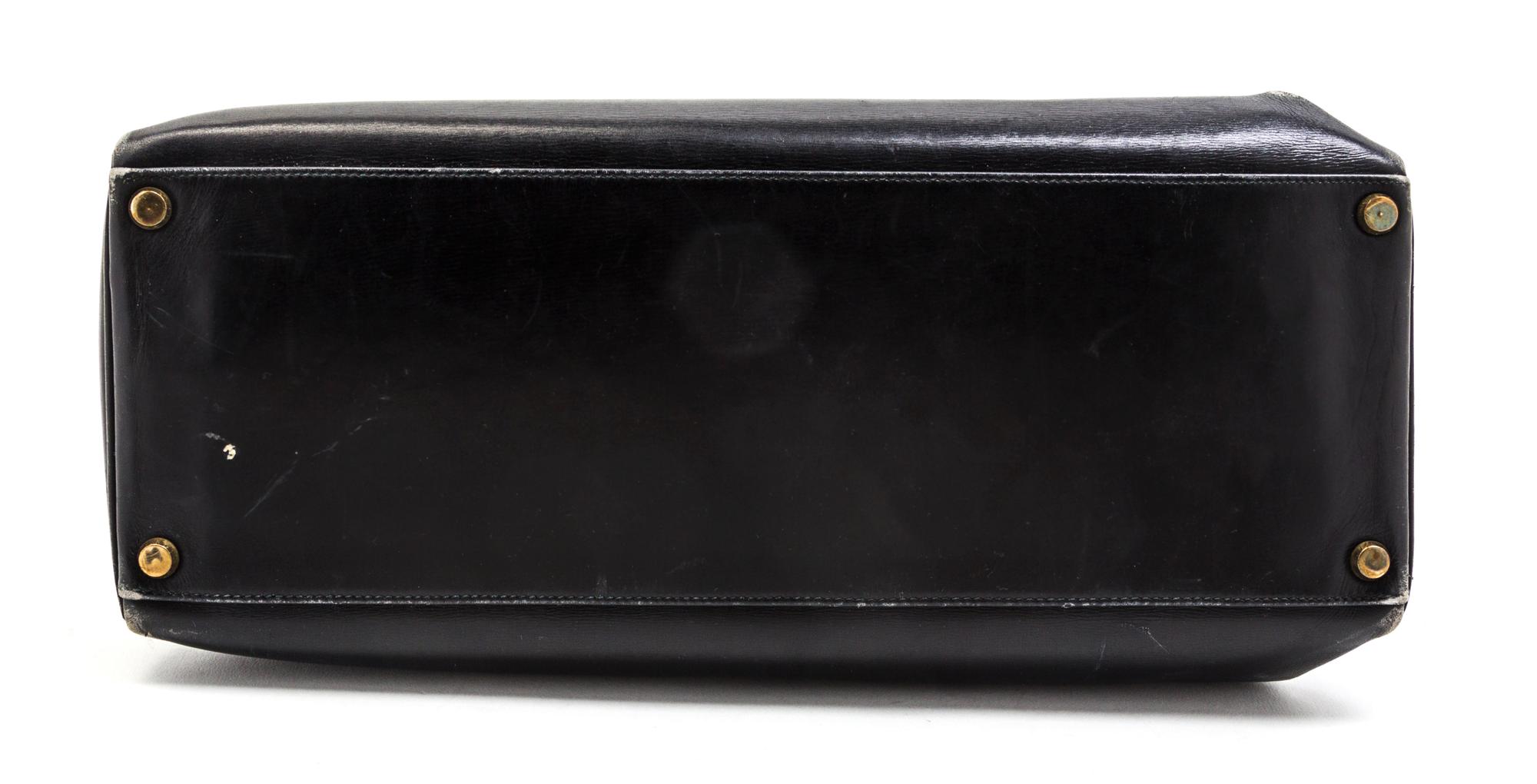An Hermes 35cm Black Leather Kelly Bag, 14 x 8 x 7 inches.