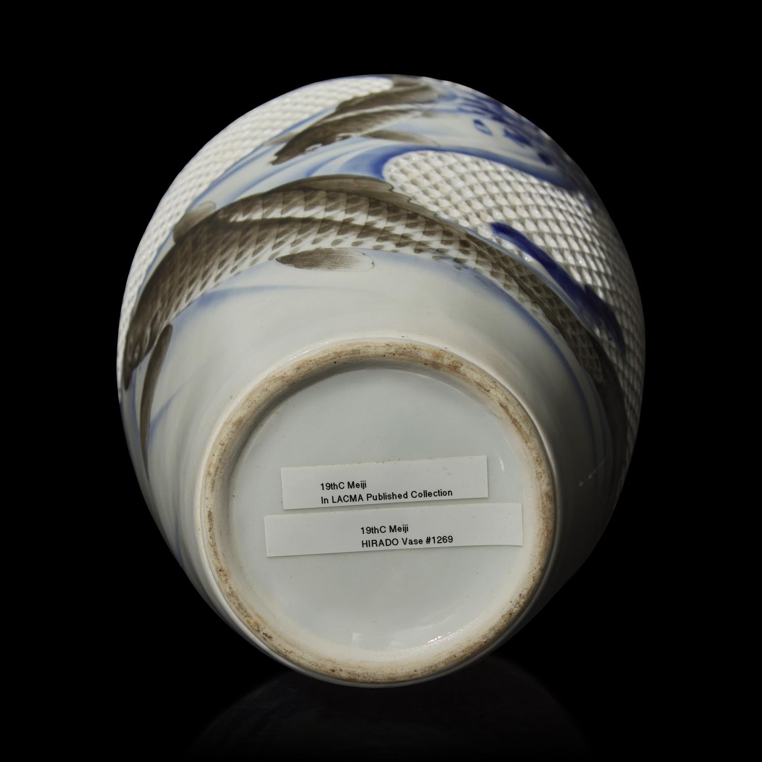 A Japanese Hirado Blue and White Porcelain Reticulated Double-Walled 'Koi and Flowers' Vase, Meiji/Taisho Period 日本明治/大正時期 平戶燒青花鯉魚圖賞瓶