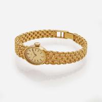 An 18K Yellow Gold Bucherer Ladies Watch