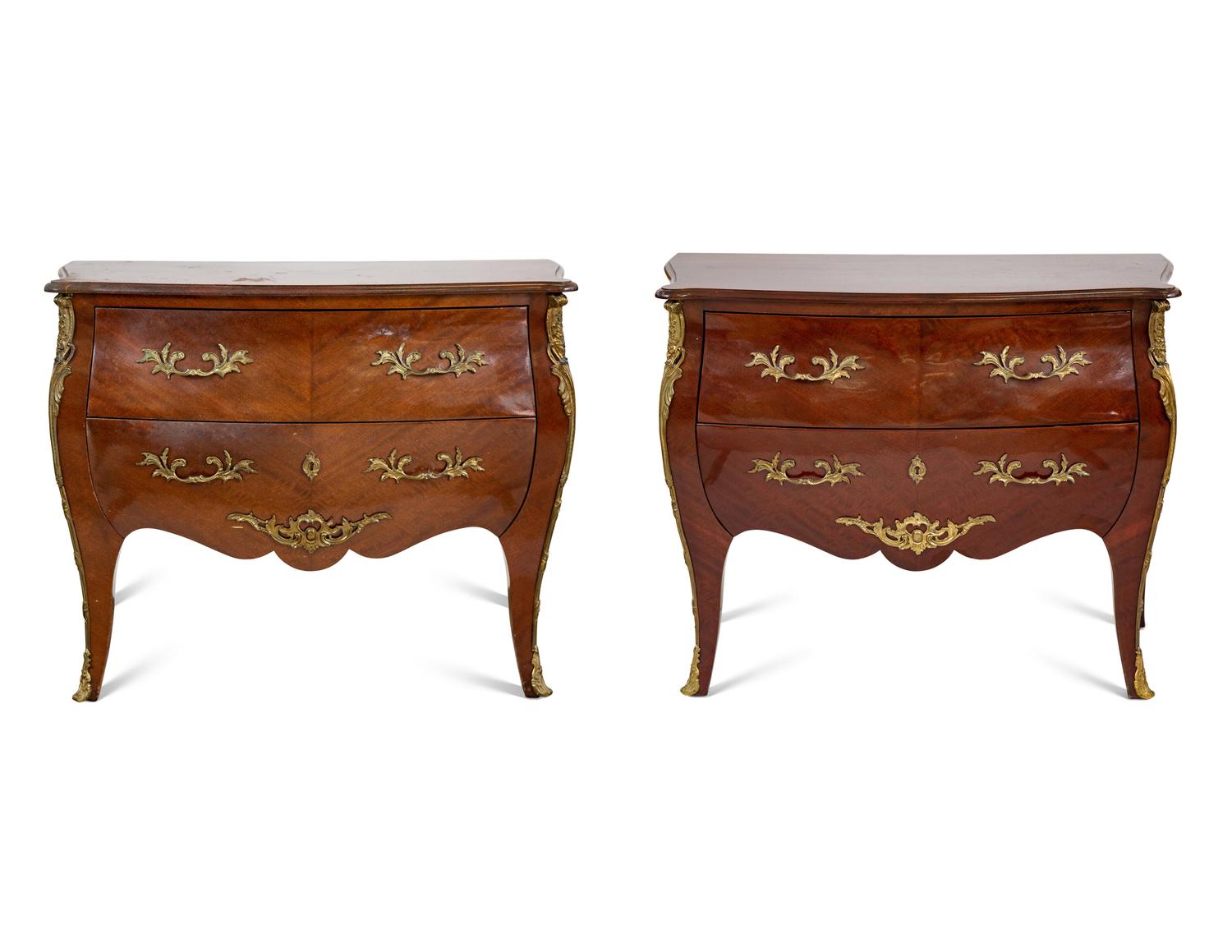 A Pair of Louis XV Style Mahogany Commodes