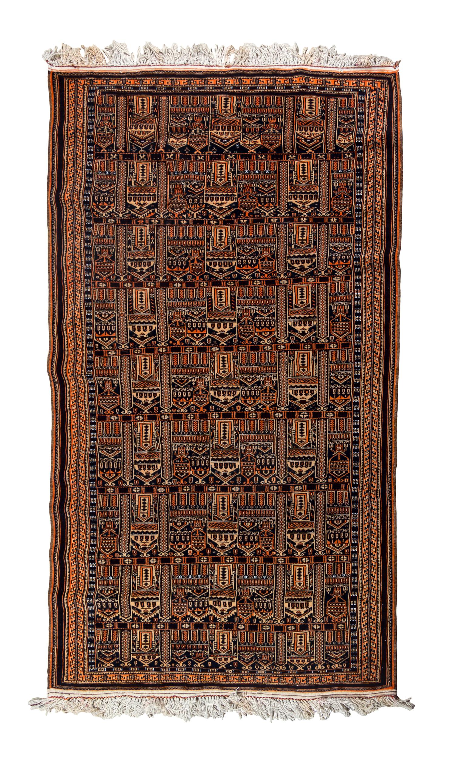 An Afghan Wool Rug 6 feet 10 inches x 3 feet 1 inch.