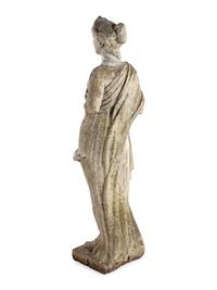 A Carved Marble Figure of a Maiden with Garlands