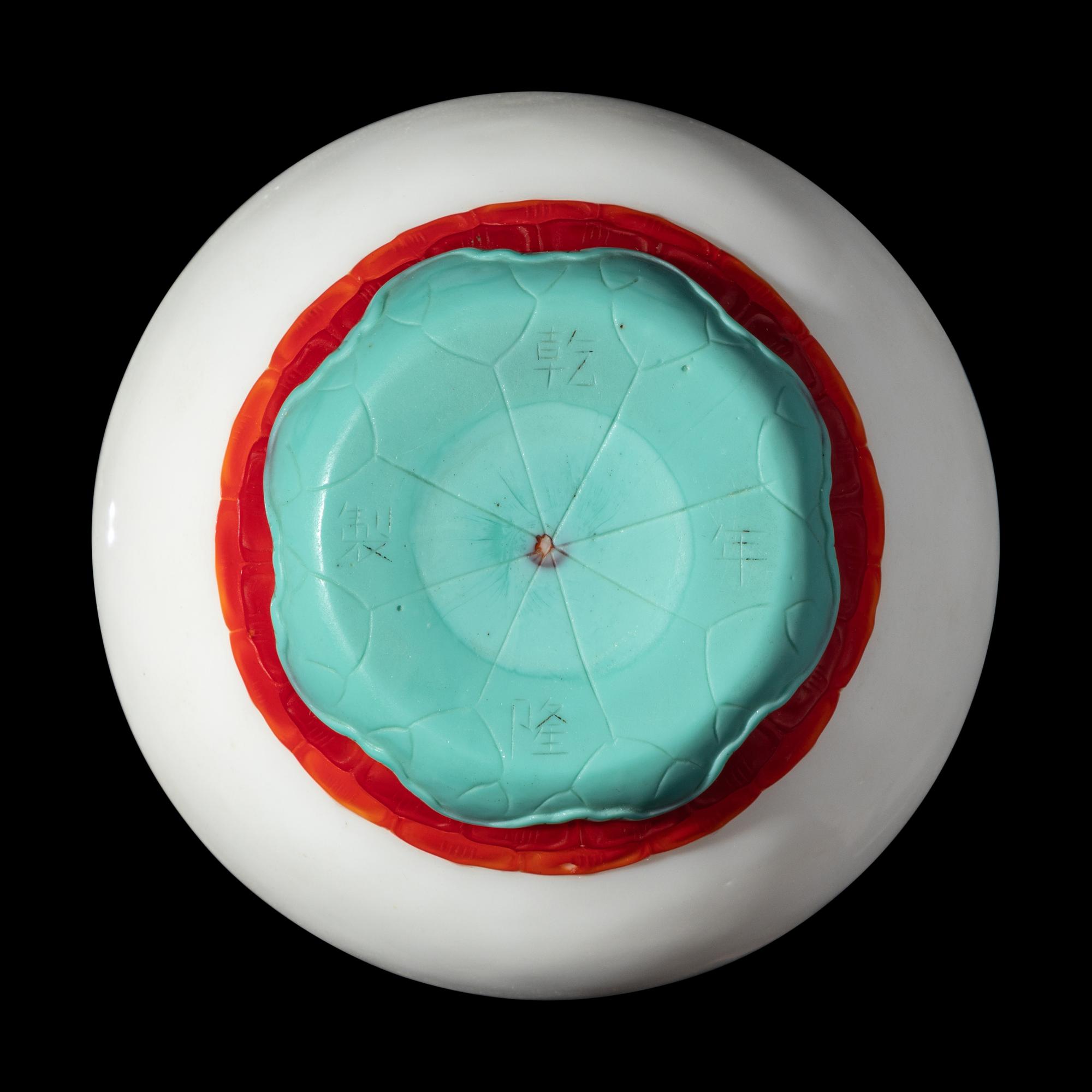 A Chinese Turquoise and Ruby Overlay White Glass Water Pot, Qianlong Mark and Period 清乾隆 白地套彩料饕餮蓮紋水盂