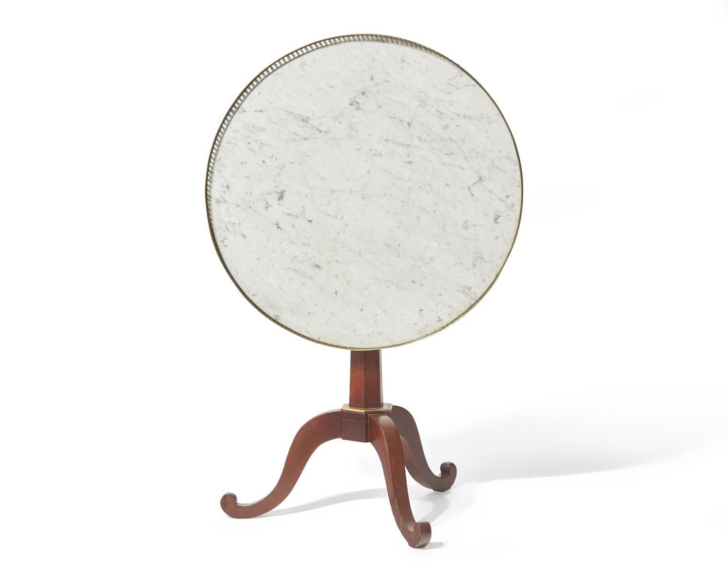 A Louis XVI inlaid fruitwood tilt-top gueridon table with white marble top, circa 1790