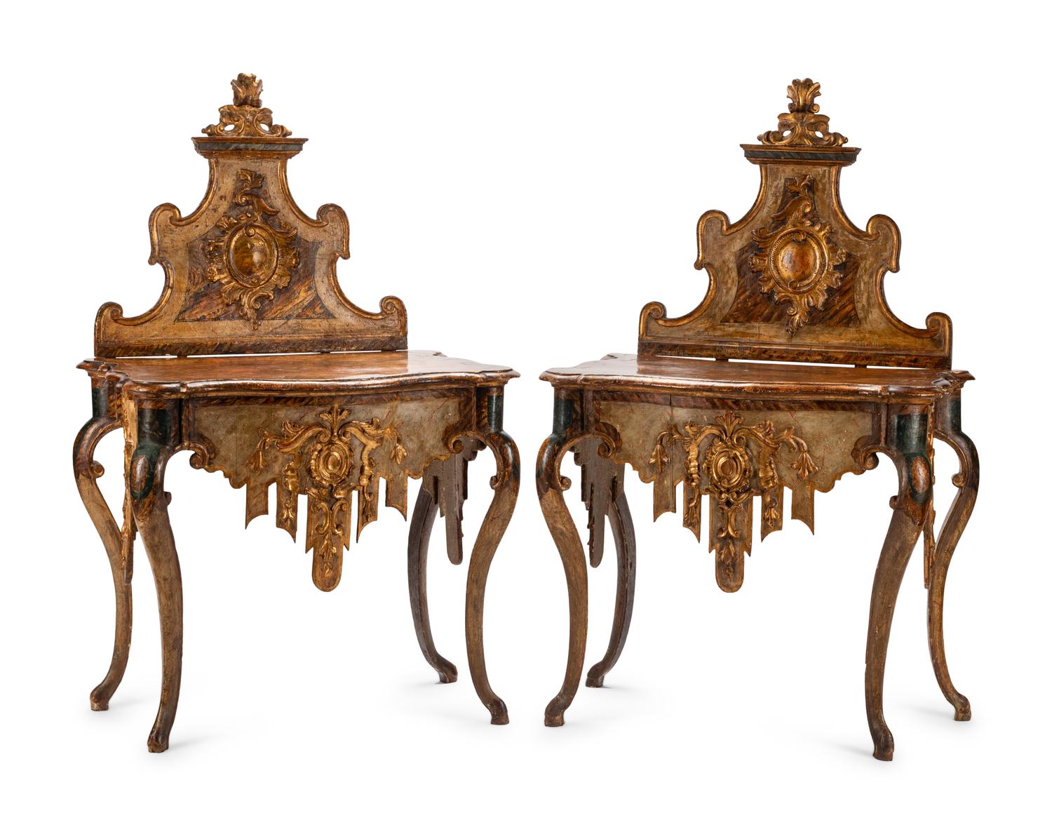 A Pair of Venetian Painted and Parcel Gilt Console Tables