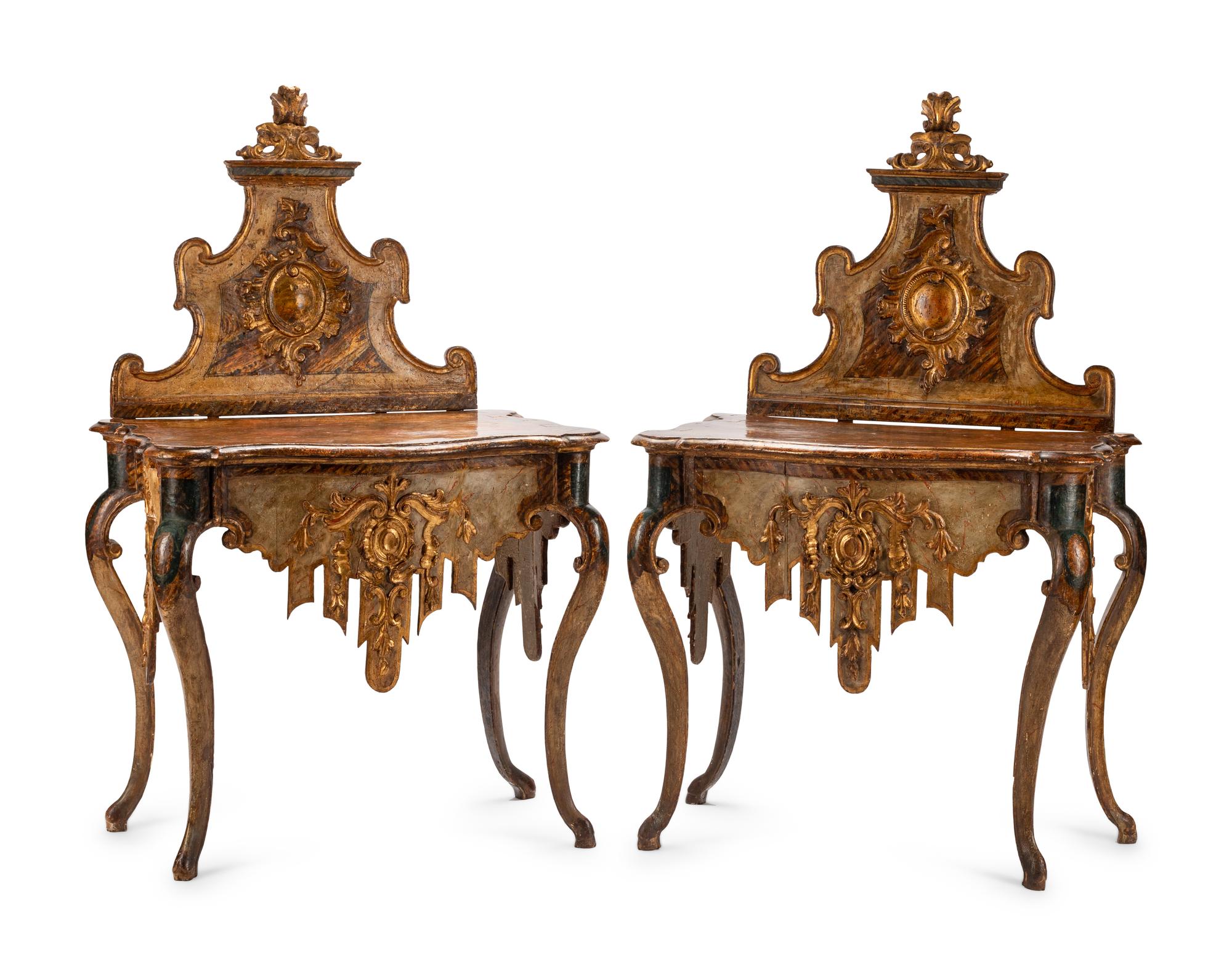 A Pair of Venetian Painted and Parcel Gilt Console Tables