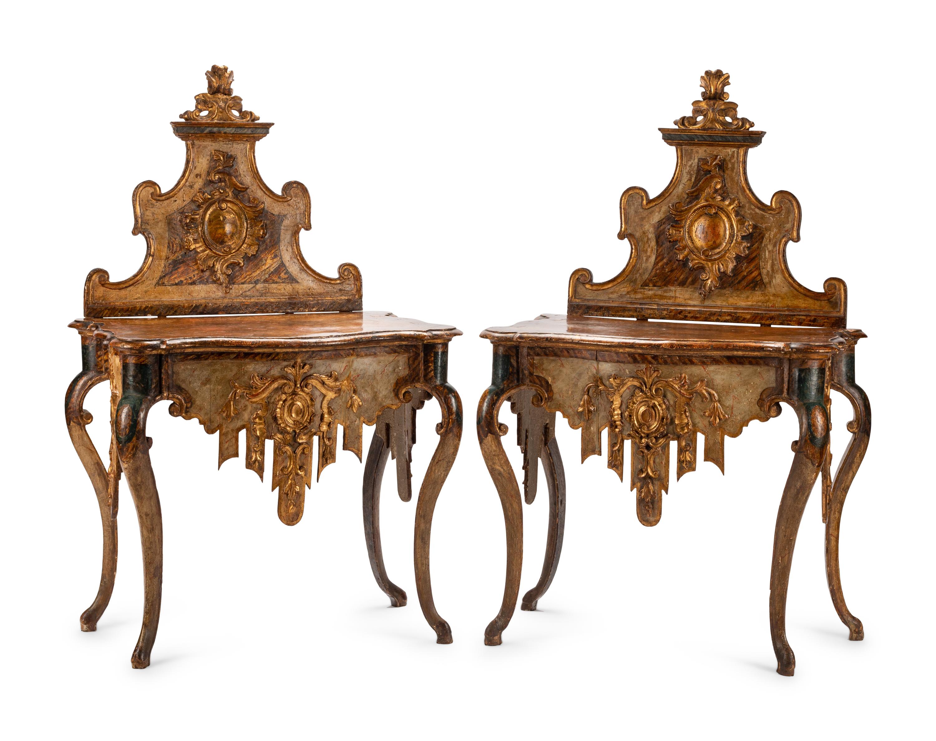 A Pair of Venetian Painted and Parcel Gilt Console Tables