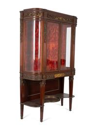 A Fine French Carved Mahogany Gilt Bronze Mounted and Glazed Curio Cabinet on Stand — CIRCA 1890