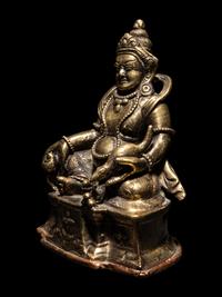 A Sino-Tibetan Bronze Figure of Jambhala