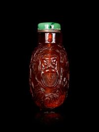 A Carved Amber Snuff Bottle