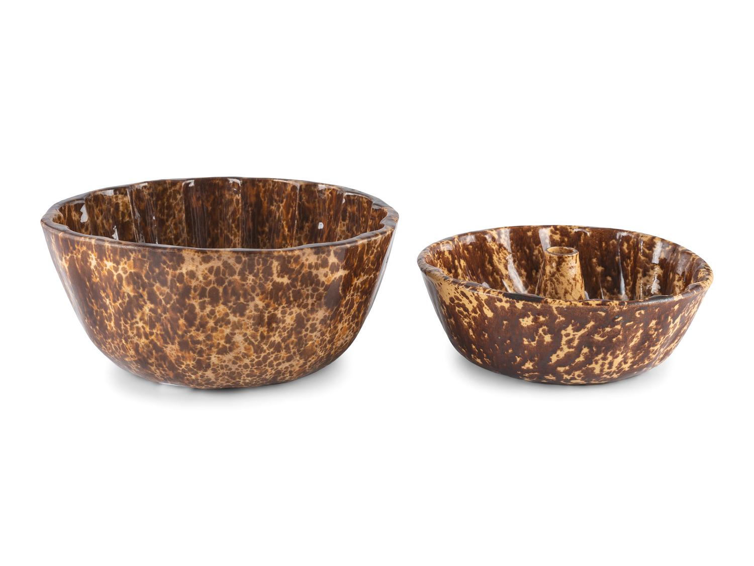 A Group of Rockingham Glaze Bowls and Molds