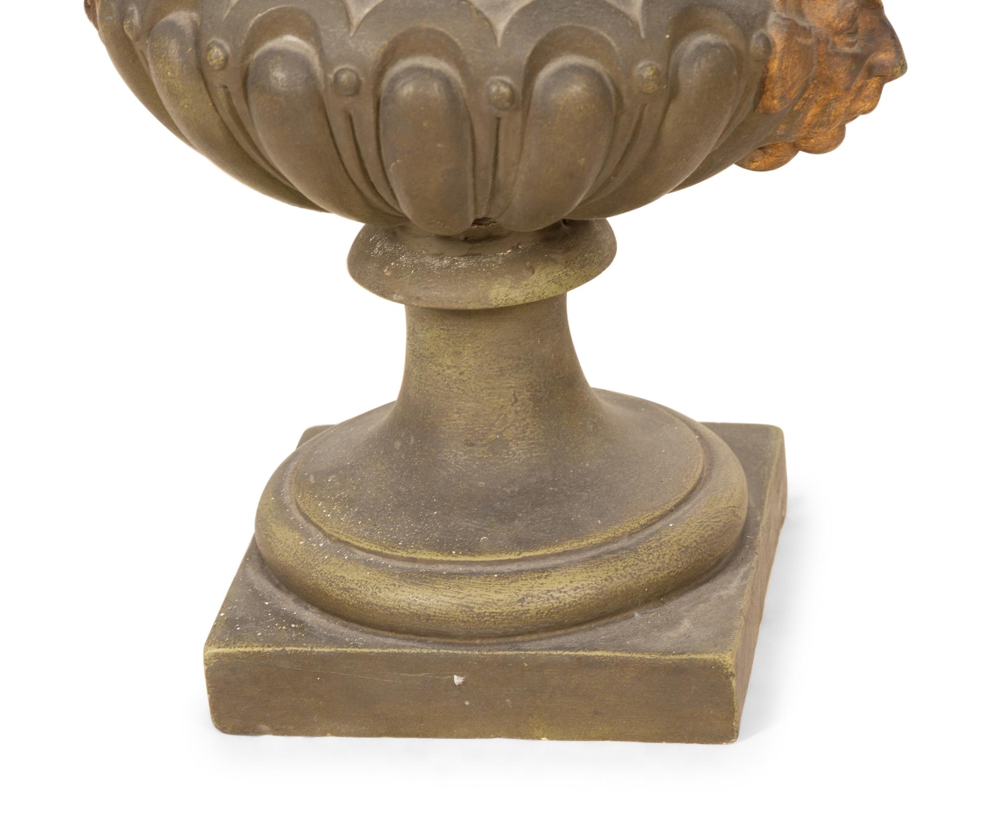 A Pair of Campana Form Painted and Parcel Gilt Ceramic Urns