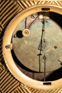 A Charles X Ormolu and Patinated Bronze Beehive Clock