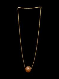A Neo-Babylonian or Graeco-Persian Smokey Chalcedony Conoid Seal Necklace