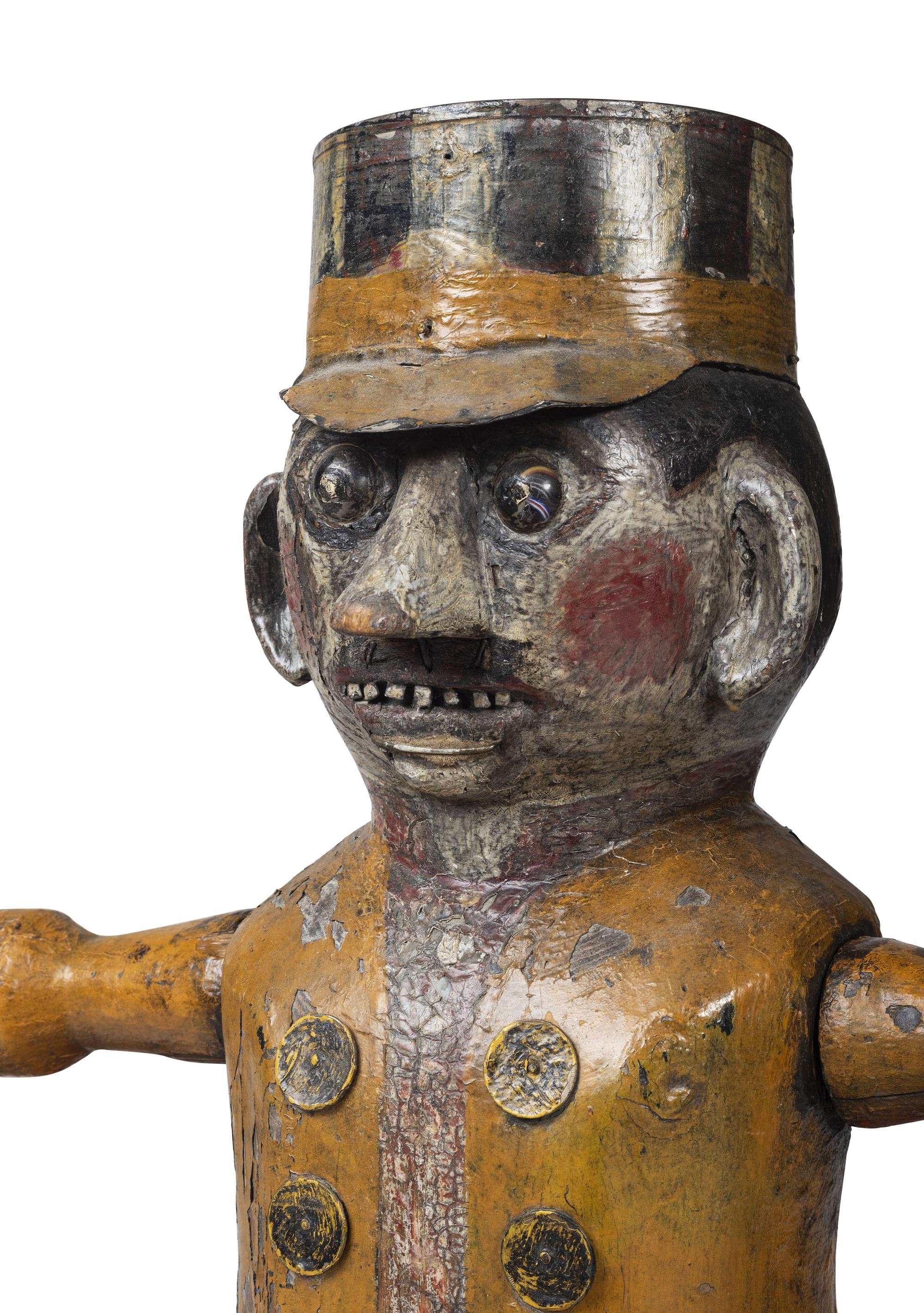A Carved and Painted Wood and Sheet-Tin Circus Ringmaster Whirligig