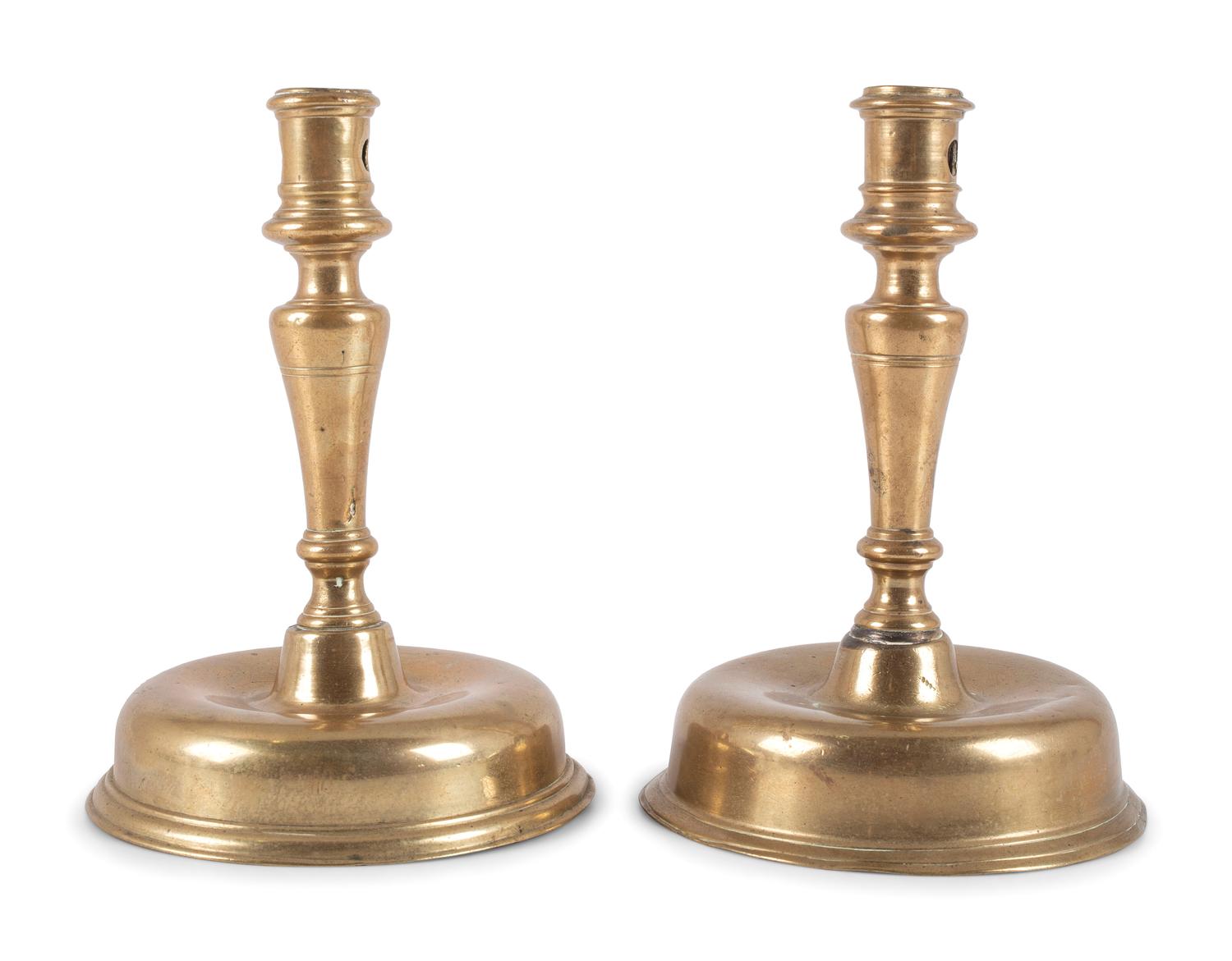 A Pair of Spanish Brass Low Bell Candlesticks