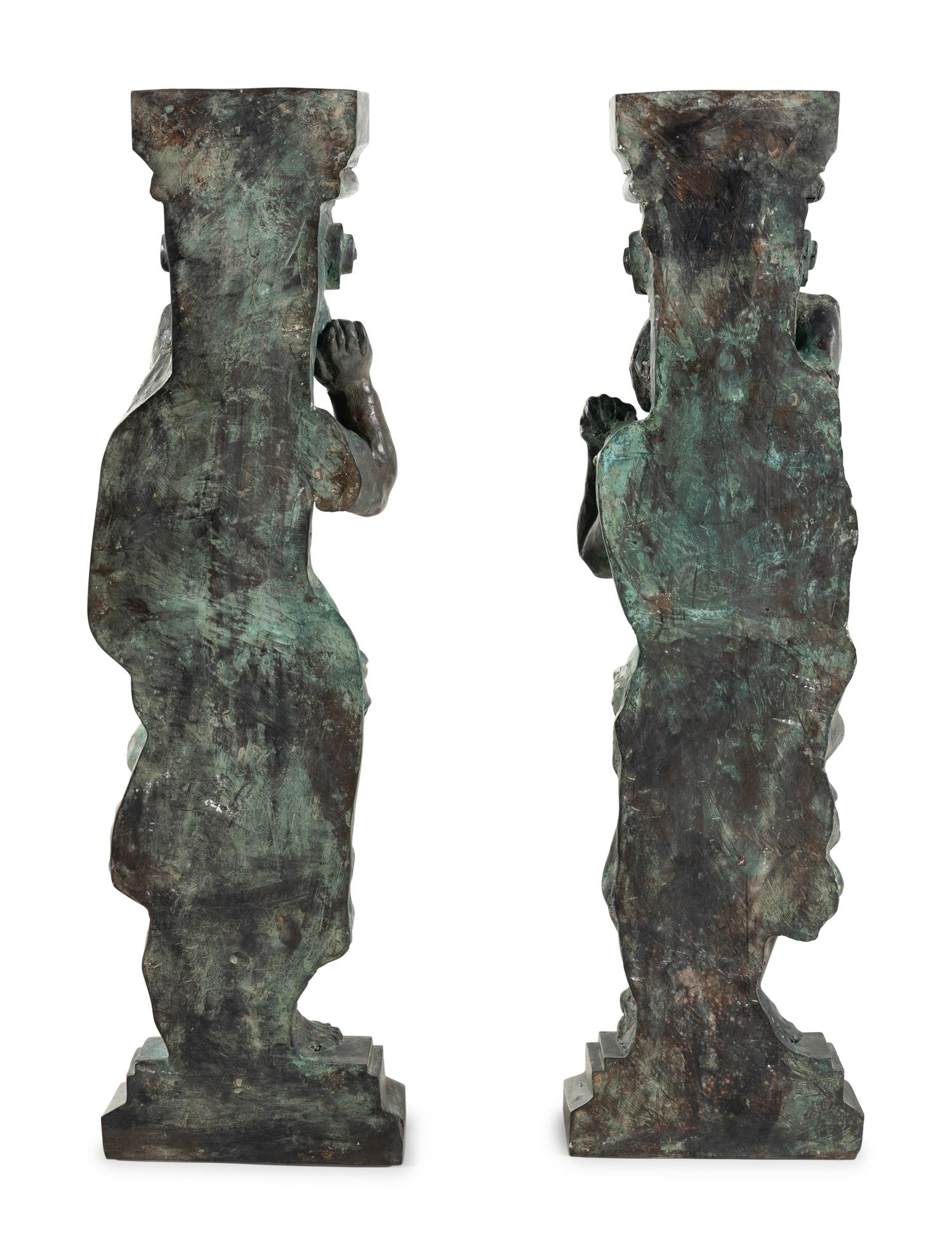 A Pair of Continental Cast Metal Figural Pedestals