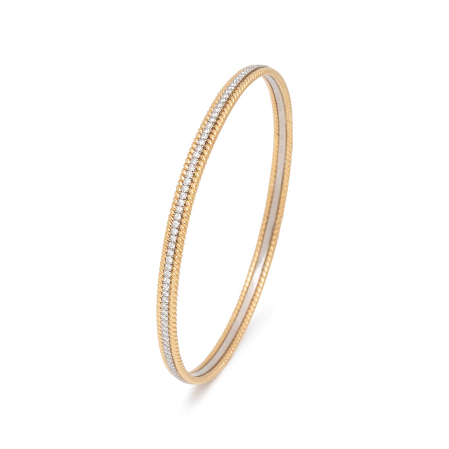 TIFFANY & CO., SCHLUMBERGER, YELLOW GOLD, PLATINUM AND DIAMOND 'ROPE' BANGLE BRACELET