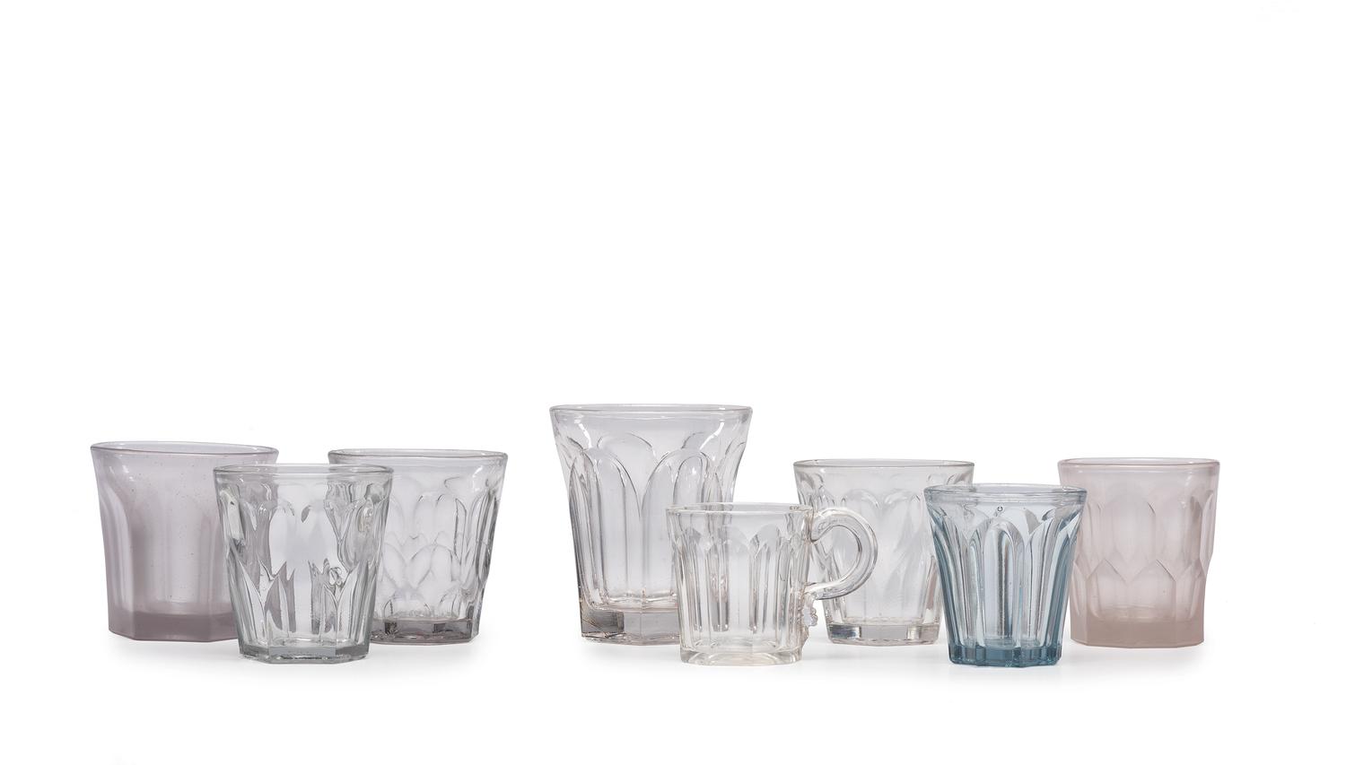 A Group of Early American Pressed Glass Clear and Aqua Tumblers and Mug