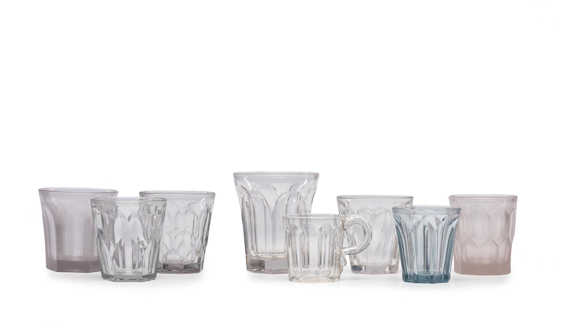A Group of Early American Pressed Glass Clear and Aqua Tumblers and Mug