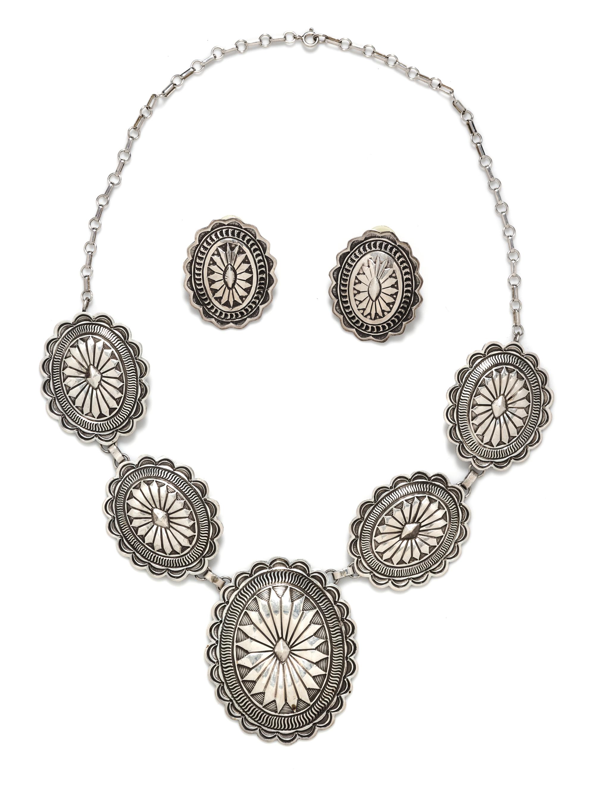 A Sterling Silver Concho Demi Parure, Pat Yellowhorse, Navajo, 86.20 dwts.