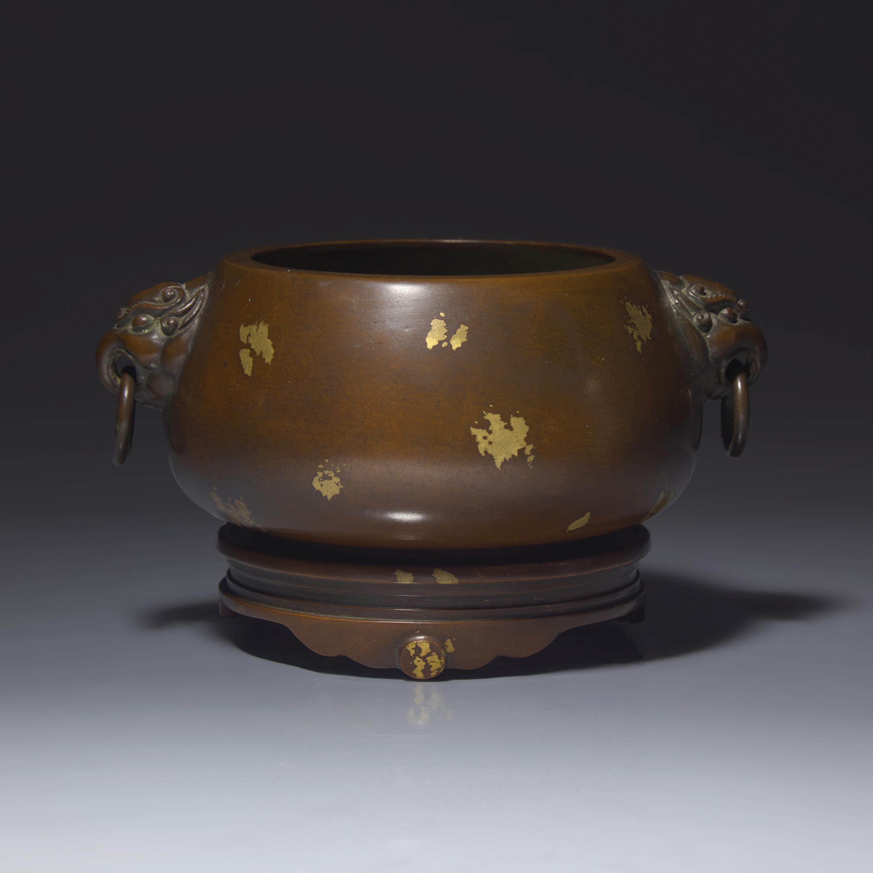 A Chinese Patinated and 'Gold-Splashed' Copper Alloy Censer and Stand — 銅灑金雙耳爐